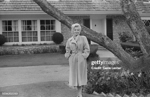 American actress Marilyn Monroe poses outside her home during a photo call, California, USA, 1956.