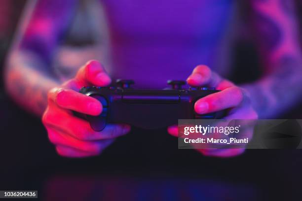 gamer hands - console stock pictures, royalty-free photos & images