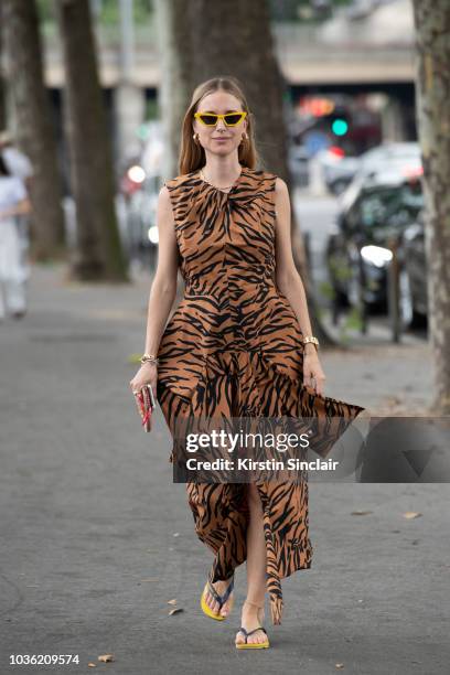 Fashion Stylist Pernille Teisbaek wears a Celine dress, Havaianas flip flops and Chimi sunglasses during Haute Couture Fall Winter 2018/2019 on July...