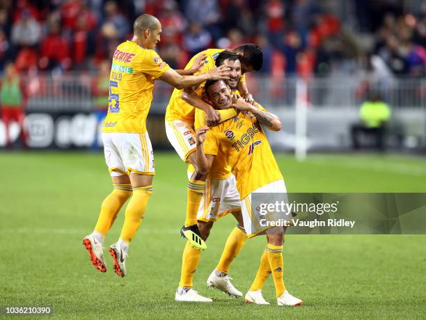 Jesús Dueñas of Tigres UANL celebrates a goal with teammates during the second half of the 2018 Campeones Cup Final against Toronto FC at BMO Field...