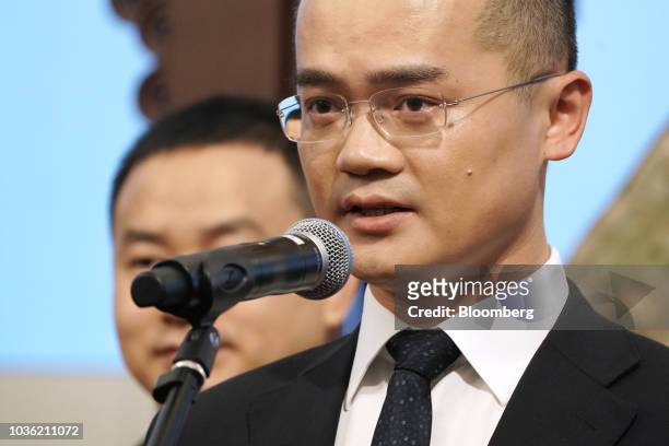 Wang Xing, chairman, chief executive officer and co-founder of Meituan Dianping, speaks during the company's listing ceremony at the Hong Kong Stock...