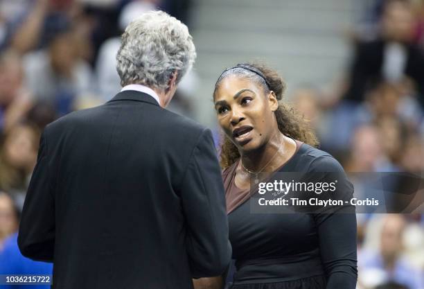 Open Tennis Tournament- Day Thirteen. Serena Williams of the United States argues with tournament referee Brian Earley during her match against Naomi...