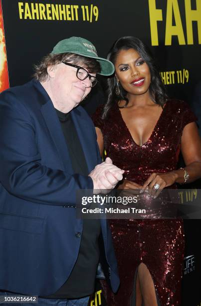 Michael Moore and Omarosa Manigault attend the Los Angeles premiere of Briarcliff Entertainment's "Fahrenheit 11/9" held at Samuel Goldwyn Theater on...