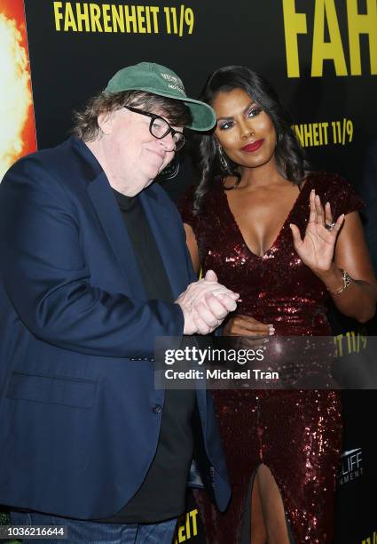 Michael Moore and Omarosa Manigault attend the Los Angeles premiere of Briarcliff Entertainment's "Fahrenheit 11/9" held at Samuel Goldwyn Theater on...