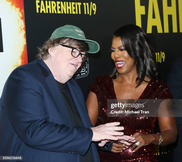 Michael Moore and Omarosa Manigault attend the Los Angeles premiere of Briarcliff Entertainment's "Fahrenheit 11/9" held at Samuel Goldwyn Theater on...