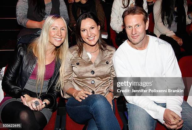 Cathy Stapelton, Renee Brack with husband Chris Brack attend the front row for the Man And Woman by Peter Morrissey, Dr Rey's Shapewear and Mensfit...