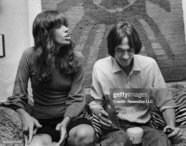 Musicians Carly Simon and James Taylor seen in their Manhattan apartment on August 28, 1972.