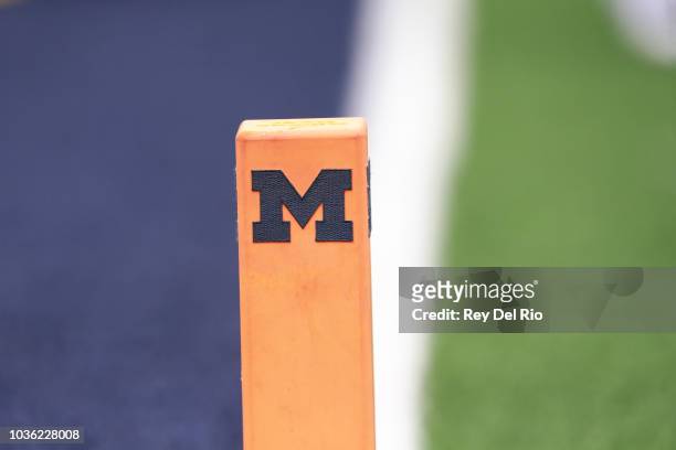 Detail view of a end zone pylon with the Michigan Wolverines logo during the game against the Western Michigan Broncos at Michigan Stadium on...