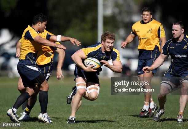 David Pocock runs with the ball during an Australian Wallabies training session at Bishops High School on August 25, 2010 in Cape Town, South Africa.