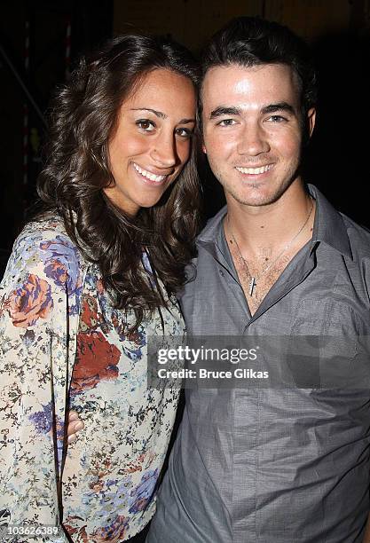 *Exclusive Coverage* Danielle Deleasa Jonas and husband Kevin Jonas pose backstage at The Addams Family" On Broadway at the Lunt-Fontanne Theatre on...