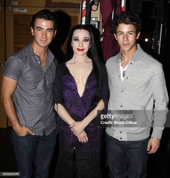 *Exclusive Coverage* Kevin Jonas, Bebe Neuwirth as "Morticia Addams" and Nick Jonas pose backstage at The Addams Family" On Broadway at the...