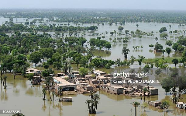 This picture shows an aerial view of the flood affected village of Shah Jamaal in the district of Muzaffarragh in Punjab on August 22, 2010. UN...