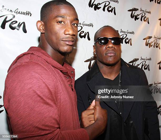 Player Antrel Rolle and singer-songwriter Sean Garrett attend Sean Garrett's "The Inkwell" MixTape Launch Party at Lucky Strike on August 24, 2010 in...