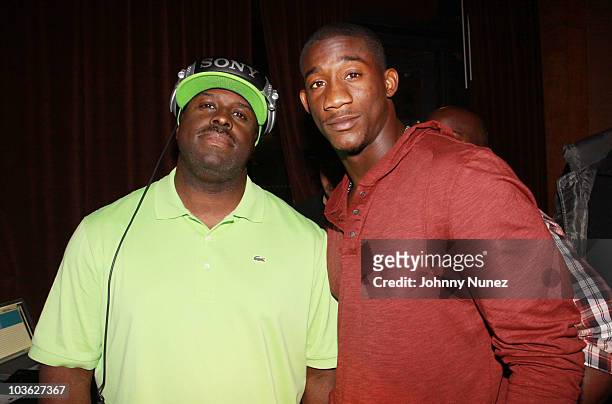 Funkmaster Flex and NFL player Antrel Rolle attend Sean Garrett's "The Inkwell" MixTape Launch Party at Lucky Strike on August 24, 2010 in New York...