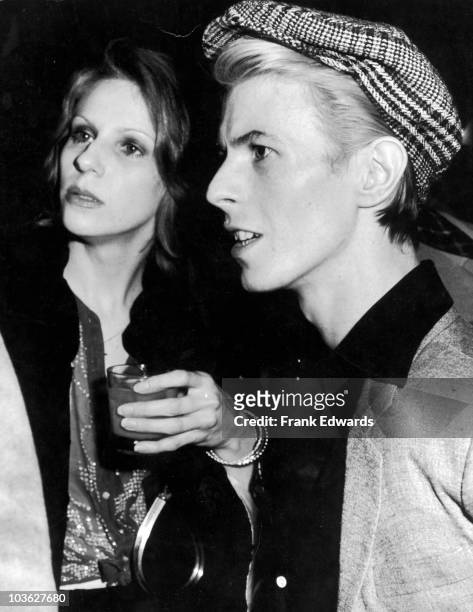 English singer David Bowie and his wife Angela, at the American Film Institute reception for film director Michelangelo Antonioni at Greystone...