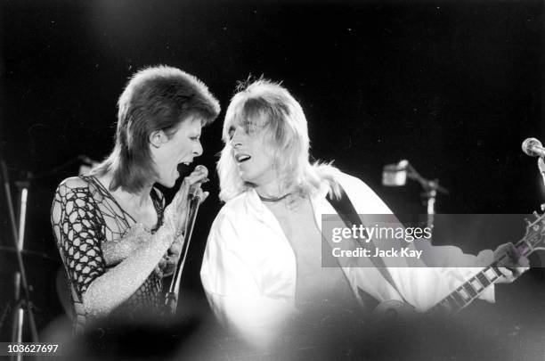 David Bowie performing with guitarist Mick Ronson at a live recording of 'The 1980 Floor Show' for the NBC 'Midnight Special' TV show, at The Marquee...