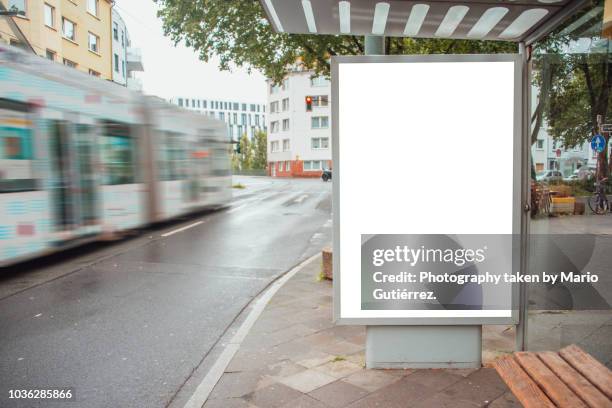 tram stop with billboard - billboard blank photos et images de collection