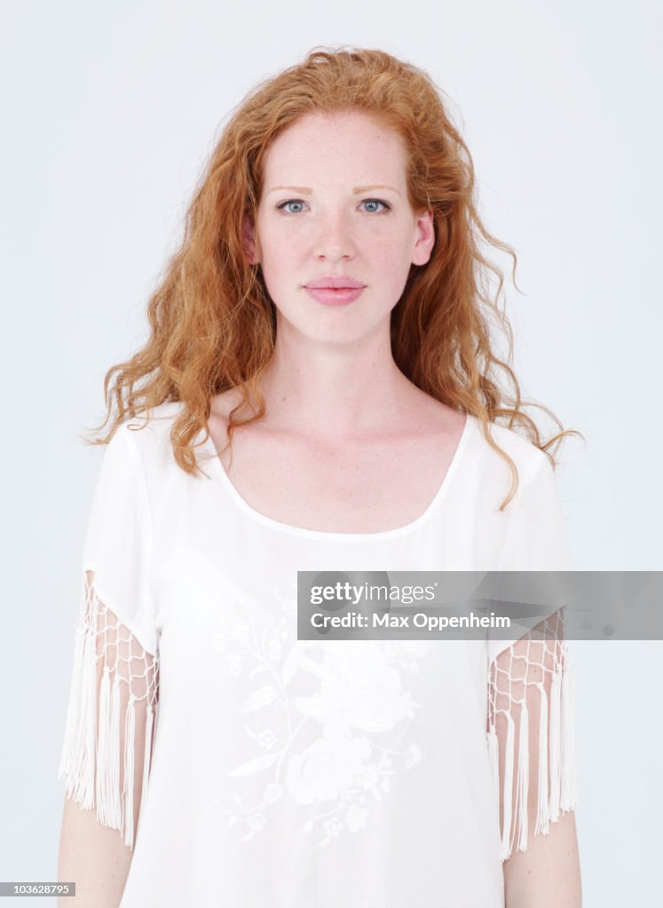 Portrait of female with long red hair