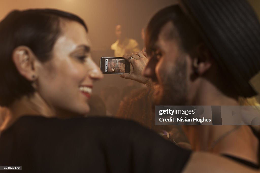 Young couple together in nightclub