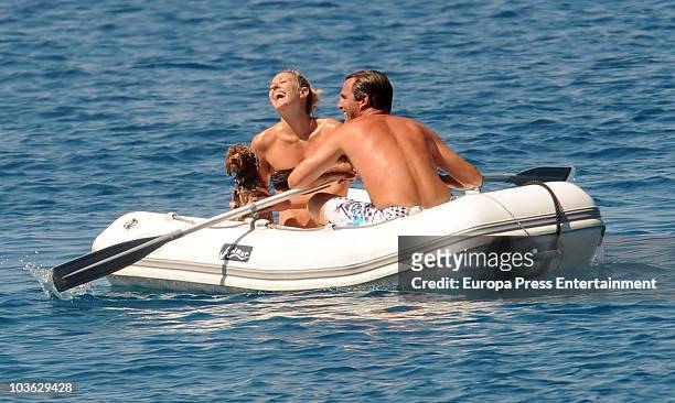 Prince Nikolaos of Greece and Tatiana Blatnik sit in a raft on August 24, 2010 in Spetses, Greece.