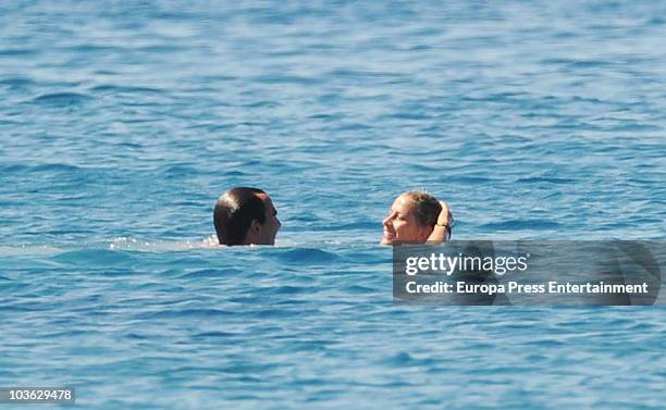 Prince Nikolaos of Greece and Tatiana Blatnik sit in a raft on August 24, 2010 in Spetses, Greece.