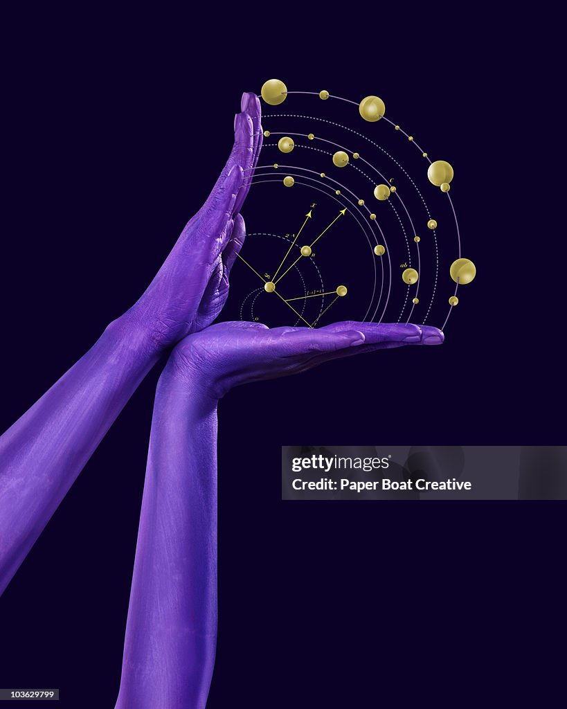 Purple hand with abstract geometric designs