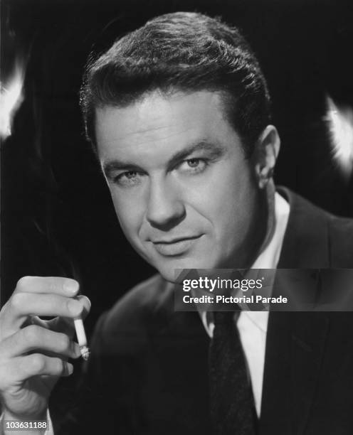 Actor Cliff Robertson pictured smoking, circa 1955.
