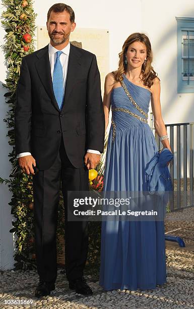 Prince Felipe of Spain and Princess Letizia of Spain arrive to attend the wedding of Tatiana Blatnik with Prince Nikolaos of Greece at the Cathedral...