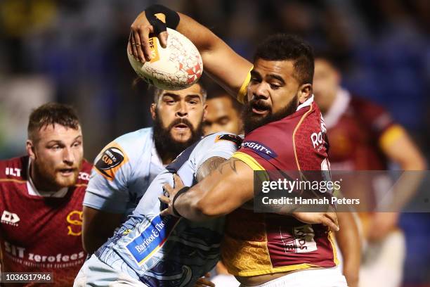 Christopher Apopa of Southland looks to offload the ball during the round six Mitre 10 Cup match between Northland and Southland at Toll Stadium on...