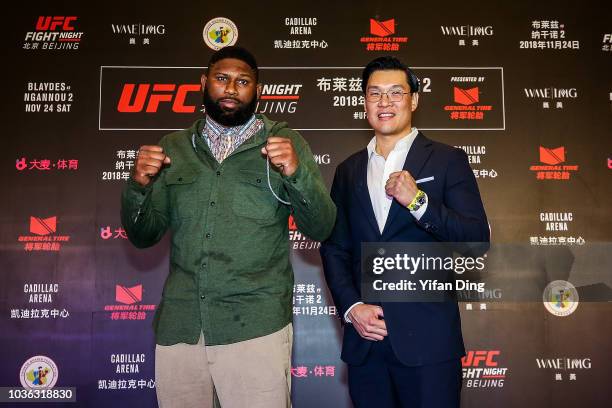 The vice president of UFC APAC Kevin Chang and UFC fighter Curtis Blaydes pose for photo during UFC Fight Night Beijing On-Sale press conference at W...