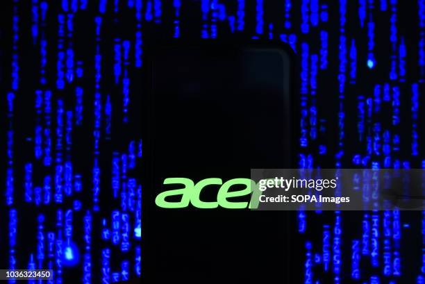 In this photo illustration, the Acer logo is seen displayed on an Android mobile phone.