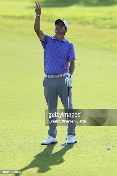 Felipe Aguilar of Chile assesses the wind direction on the 1st hole during Day One of the Portugal Masters at Dom Pedro Victoria Golf Course on...