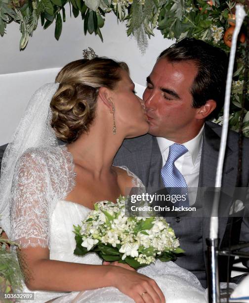 Prince Nikolaos of Greece and Princess Nikolaos of Greece and Denmark kiss after getting married at the Cathedral of Ayios Nikolaos on August 25,...