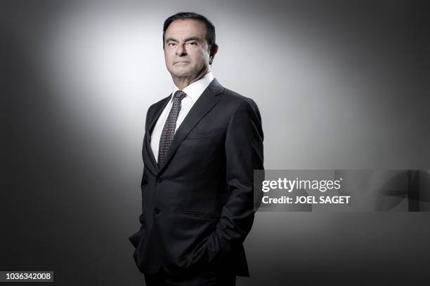 French Renault group CEO and chairman of Japan's Nissan Motor CO. Ltd and Mitsubishi Motors Corp, Carlos Ghosn poses during a photo session at the...