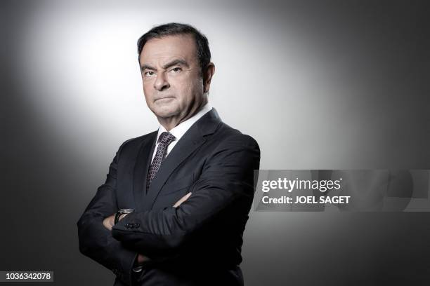 French Renault group CEO and chairman of Japan's Nissan Motor CO. Ltd and Mitsubishi Motors Corp, Carlos Ghosn poses during a photo session at the...