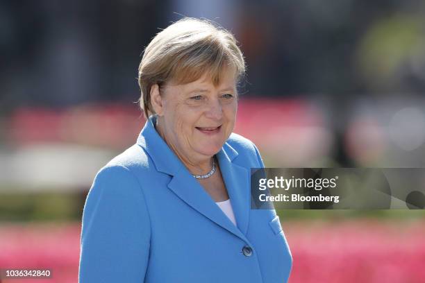 Angela Merkel, Germany's chancellor, arrives for a family photo during an informal meeting of European Union leaders in Salzburg, Austria, on...