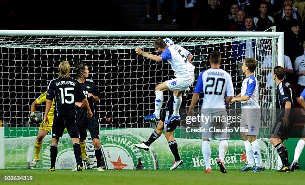 Solvi Ottesen of FC Copenhagen scores the first goal during the Champions League Play-off match between FC Copenaghen and Rosenborg on August 25,...