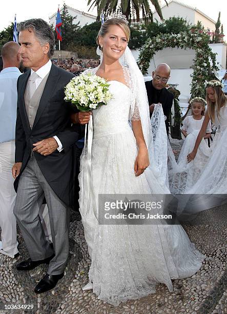 Tatiana Blatnik and her father Atilio Brillembourg arrive at the Cathedral of Ayios Nikolaos for her wedding to Prince Nikolaos of Greece on August...