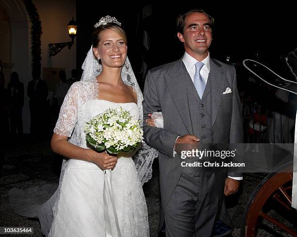 Prince Nikolaos of Greece and Princess Nikolaos of Greece and Denmark kiss after getting married at the Cathedral of Ayios Nikolaos on August 25,...