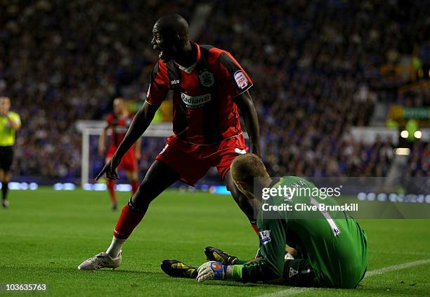 Theo Robinson of Huddersfield Town appeals for a foul after colliding with Everton keeper Jan Mucha during the Carling Cup second round match between...