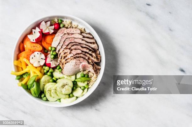 vegetables with slices of pork loin - paleo diet stock pictures, royalty-free photos & images
