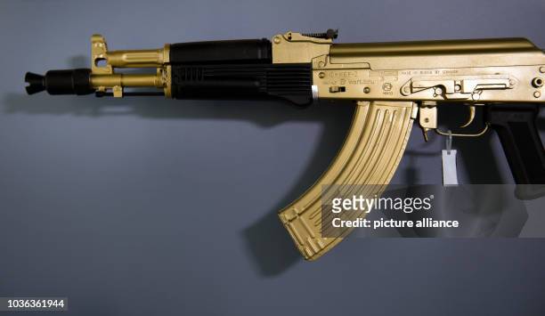 43 Gold Kalashnikov Photos and Premium High Res Pictures - Getty Images