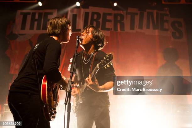 Pete Doherty and Carl Barat of The Libertines perform on stage at The Forum on August 25, 2010 in London, England.