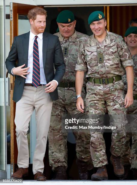 Prince Harry, Duke of Sussex visits The Royal Marines Commando Training Centre on September 13, 2018 in Lympstone, England. The Duke arrived at the...