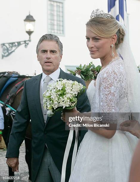 Tatiana Blatnik and her father Atilio Brillembourg arrive at the Cathedral of Ayios Nikolaos for her wedding to Prince Nikolaos of Greece on August...