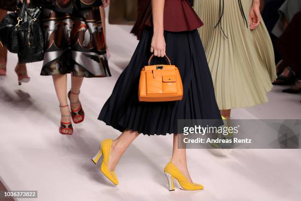 Model, bag detail, walks the runway at the Fendi show during Milan Fashion Week Spring/Summer 2019 on September 20, 2018 in Milan, Italy.