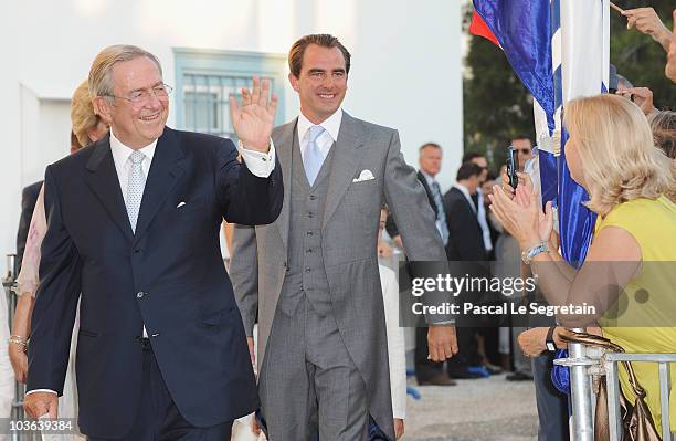 King Constantine of Greece and Prince Nikolaos of Greece arrive at The Saint Nikolaos Church on August 25, 2010 in Spetses, Greece. Representatives...