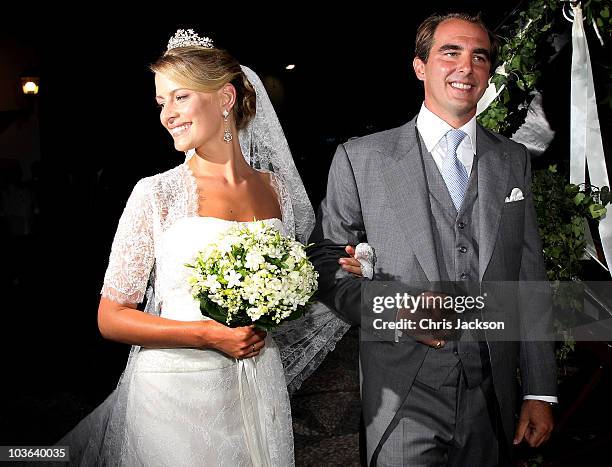 Princess Nikolaos of Greece and Denmark leave in a horse drawn carriage after getting married at the Cathedral of Ayios Nikolaos on August 25, 2010...