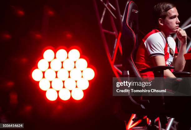 Professional esports player representing the Feyenoord football team plays the FIFA 18 video game during an esports exhibition match at the Tokyo...