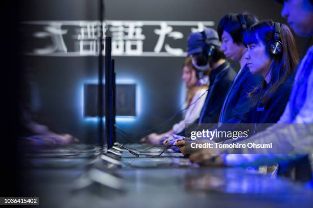 Attendees play video games during the Tokyo Game Show 2018 on September 20, 2018 in Chiba, Japan. The Tokyo Game Show is held from September 20 to...